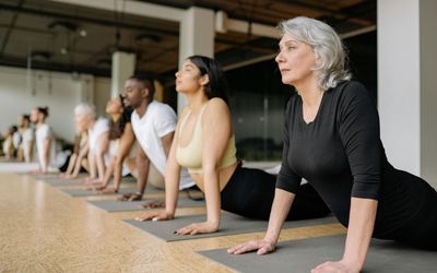 Person stretching gently, improving flexibility.